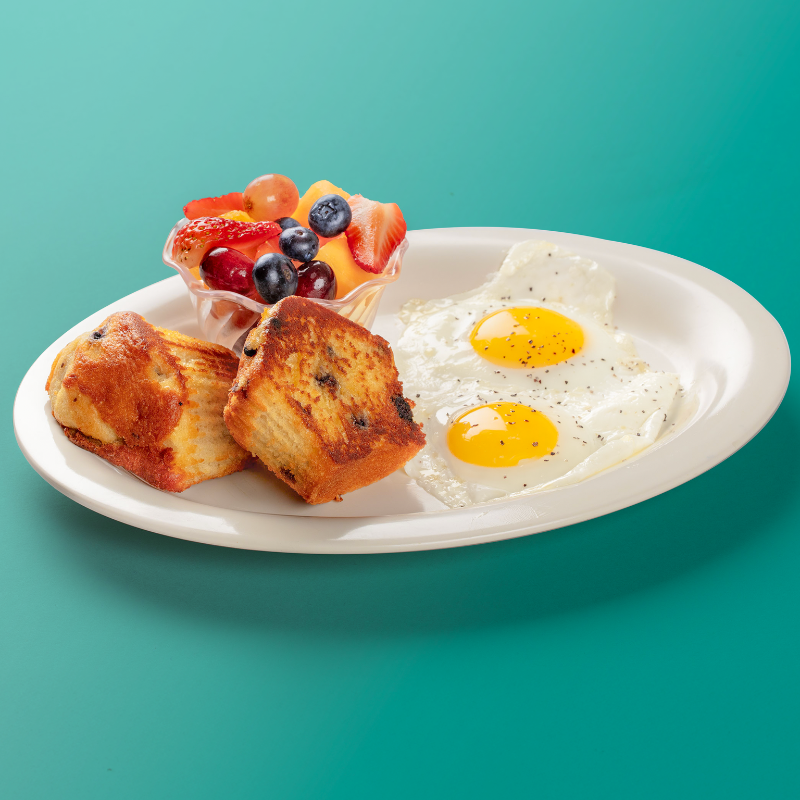 Blueberry muffin and eggs